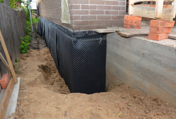 SJ Waterproofing Pros technician performing targeted Emergency Waterproofing assessment in Rochester, WI